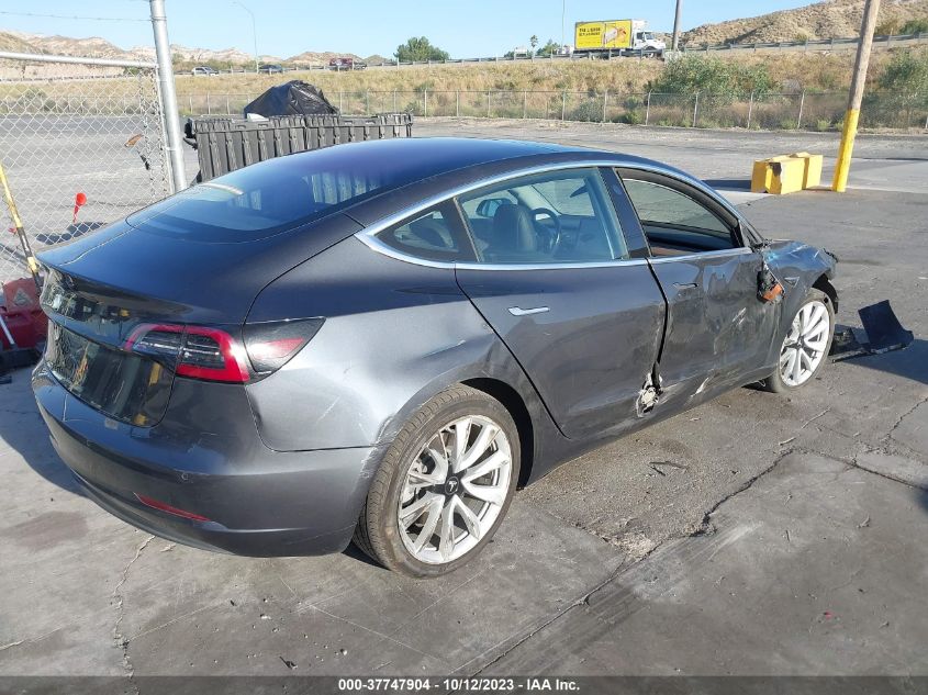 5YJ3E1EA7JF007763 2018 Tesla Model 3 Mid Range/Long Range