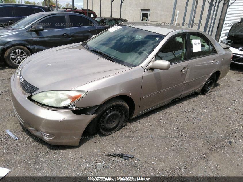 2003 Toyota Camry Le VIN: 4T1BE30K63U699138 Lot: 37777048