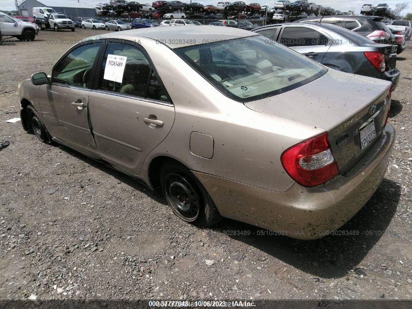 2003 Toyota Camry Le VIN: 4T1BE30K63U699138 Lot: 37777048