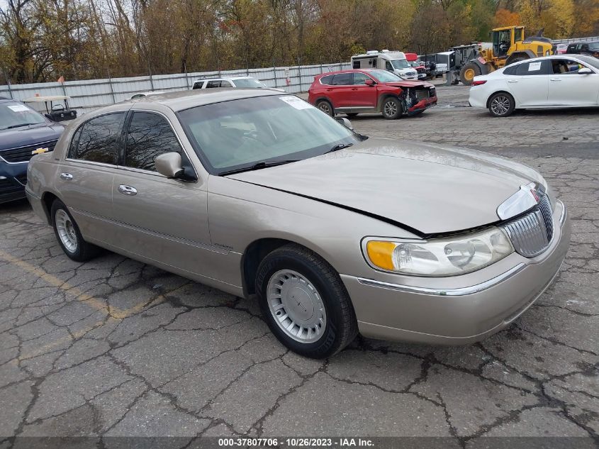 2000 Lincoln Town Car Executive VIN: 1LNHM81W0YY914007 Lot: 37807706