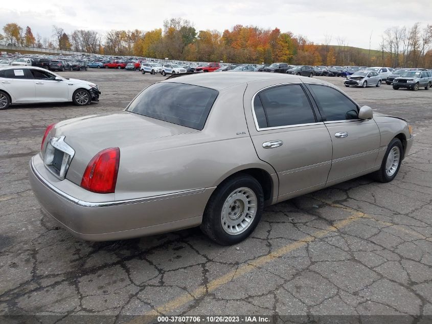 2000 Lincoln Town Car Executive VIN: 1LNHM81W0YY914007 Lot: 37807706