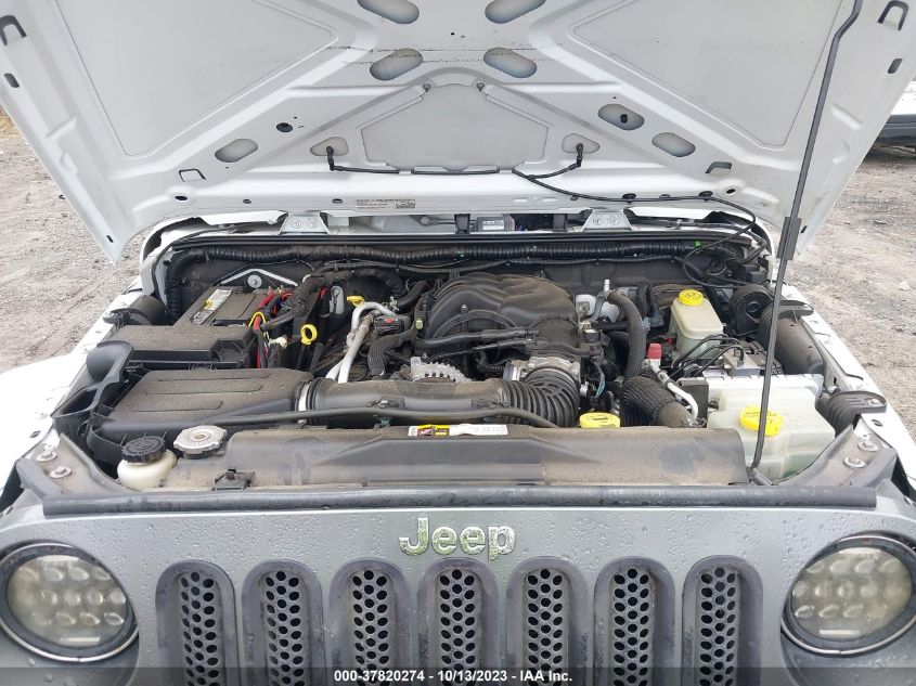 1C4BJWDG3EL200554 2014 Jeep Wrangler Unlimited Freedom Edition