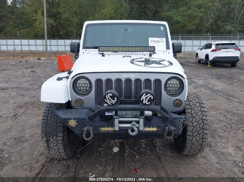 1C4BJWDG3EL200554 2014 Jeep Wrangler Unlimited Freedom Edition