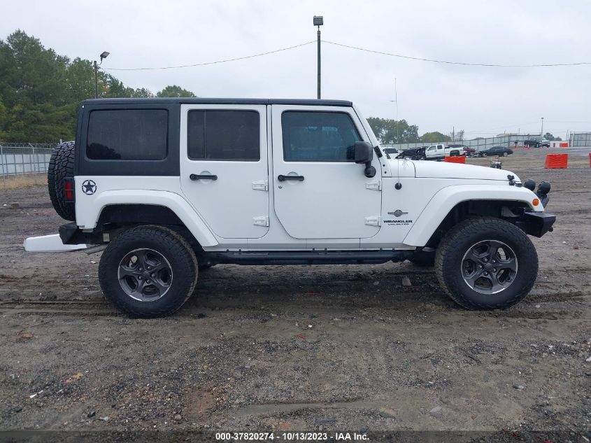 1C4BJWDG3EL200554 2014 Jeep Wrangler Unlimited Freedom Edition