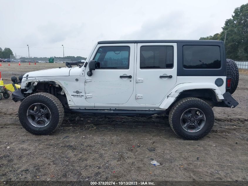 1C4BJWDG3EL200554 2014 Jeep Wrangler Unlimited Freedom Edition