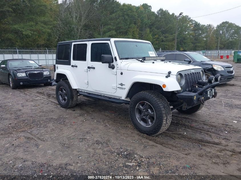 1C4BJWDG3EL200554 2014 Jeep Wrangler Unlimited Freedom Edition
