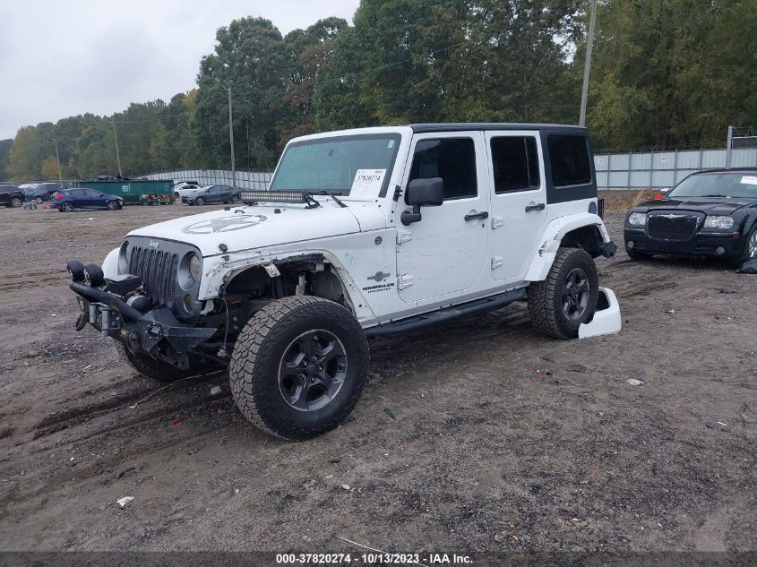 1C4BJWDG3EL200554 2014 Jeep Wrangler Unlimited Freedom Edition