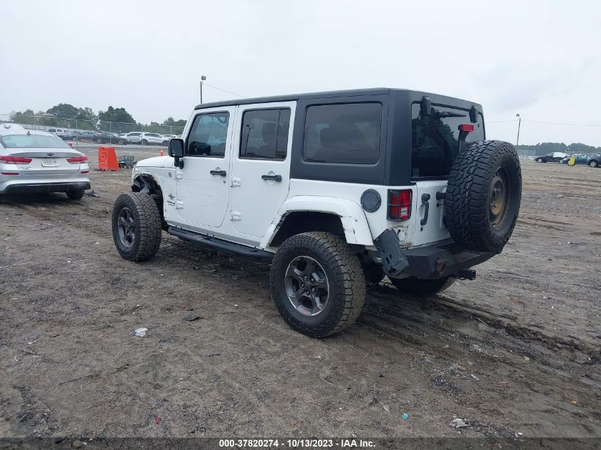 1C4BJWDG3EL200554 2014 Jeep Wrangler Unlimited Freedom Edition