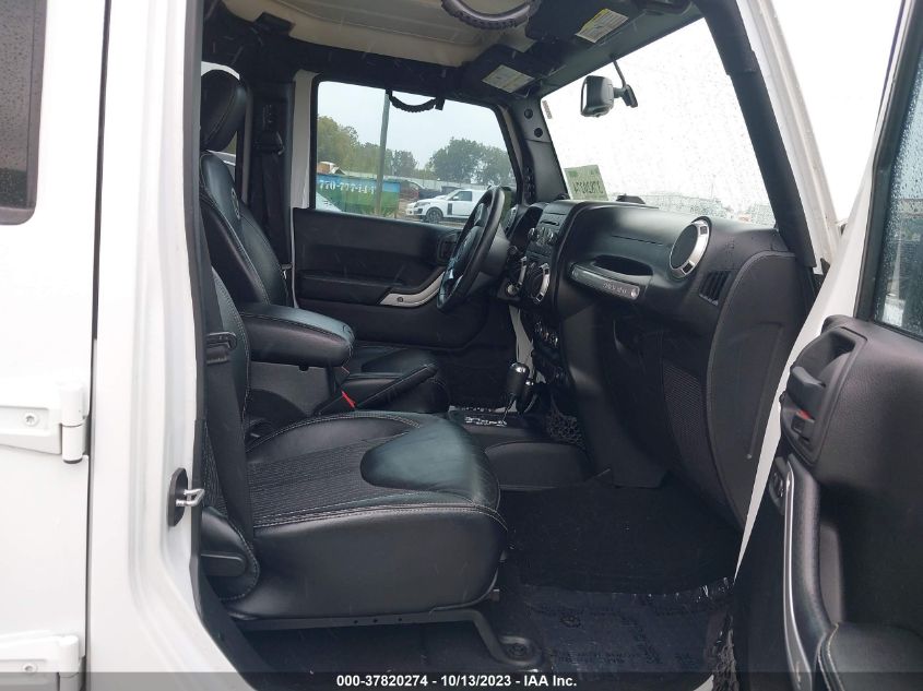 1C4BJWDG3EL200554 2014 Jeep Wrangler Unlimited Freedom Edition