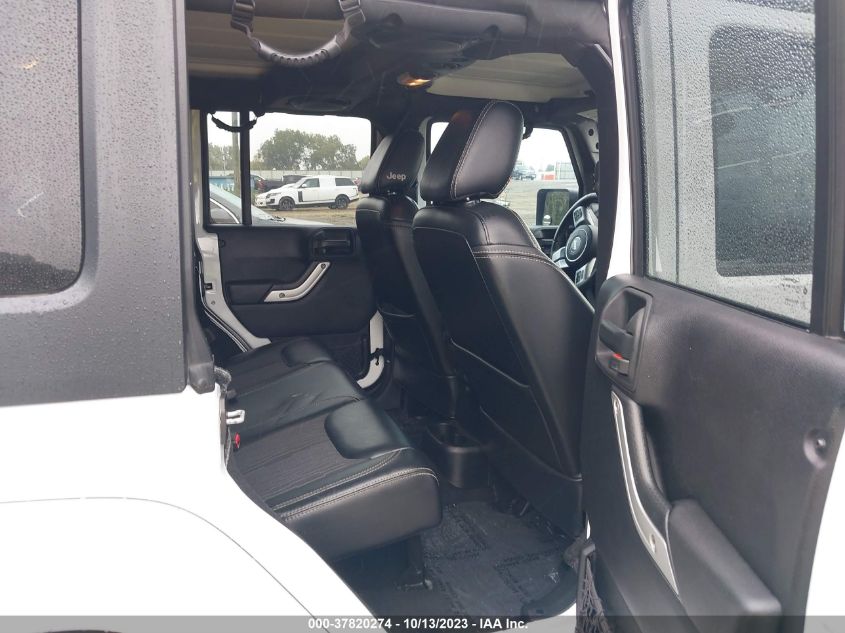 1C4BJWDG3EL200554 2014 Jeep Wrangler Unlimited Freedom Edition