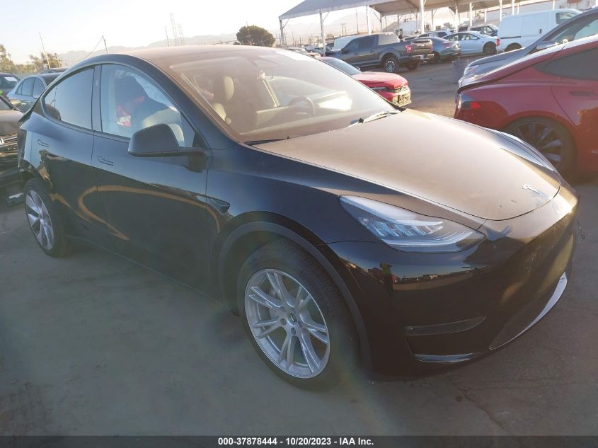 2023 Tesla Model Y Long Range VIN: 7SAYGDEE2PA137950 Lot: 37878444