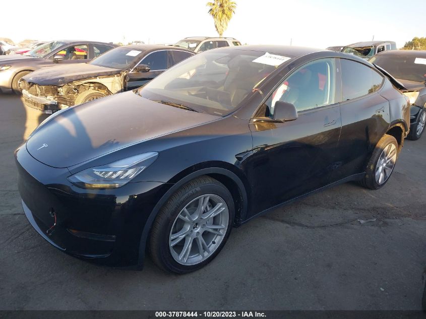 2023 Tesla Model Y Long Range VIN: 7SAYGDEE2PA137950 Lot: 37878444