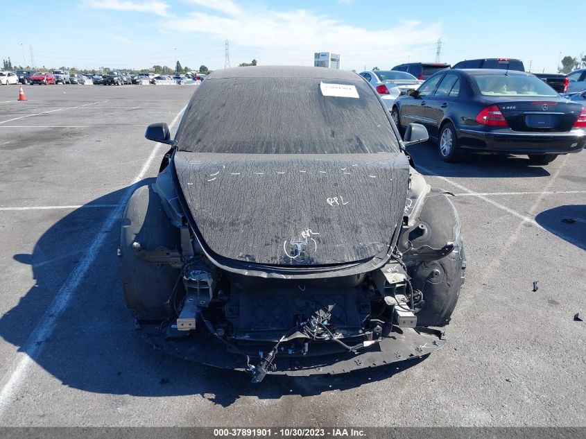 2022 Tesla Model 3 VIN: 5YJ3E1EA8NF323338 Lot: 37891901