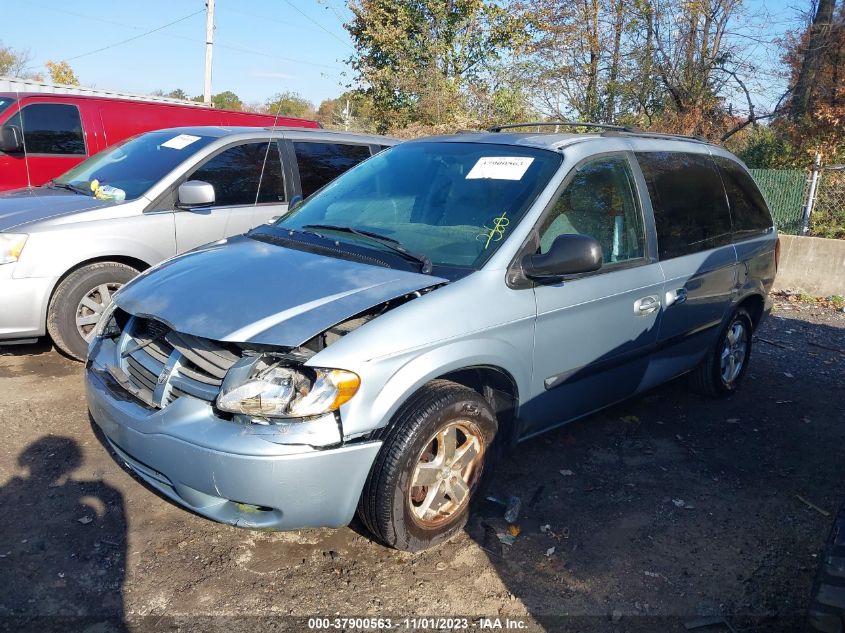 2005 Dodge Caravan Sxt VIN: 1D4GP45R35B100312 Lot: 37900563