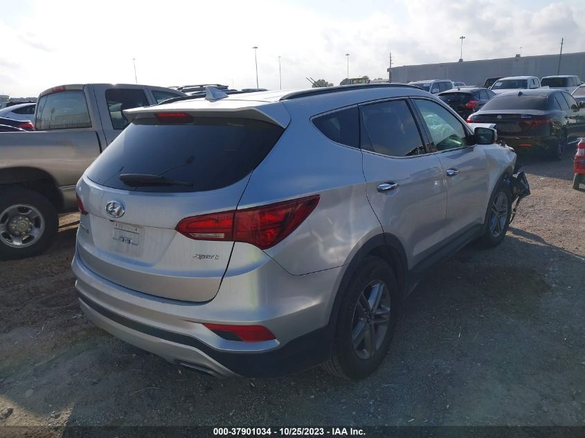 2018 Hyundai Santa Fe Sport 2.4L VIN: 5XYZU3LB1JG523114 Lot: 37901034