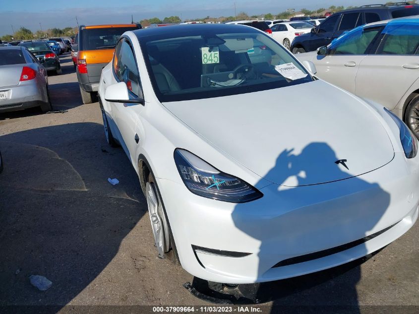 2023 Tesla Model Y VIN: 7SAYGDEE0PA157839 Lot: 37909664