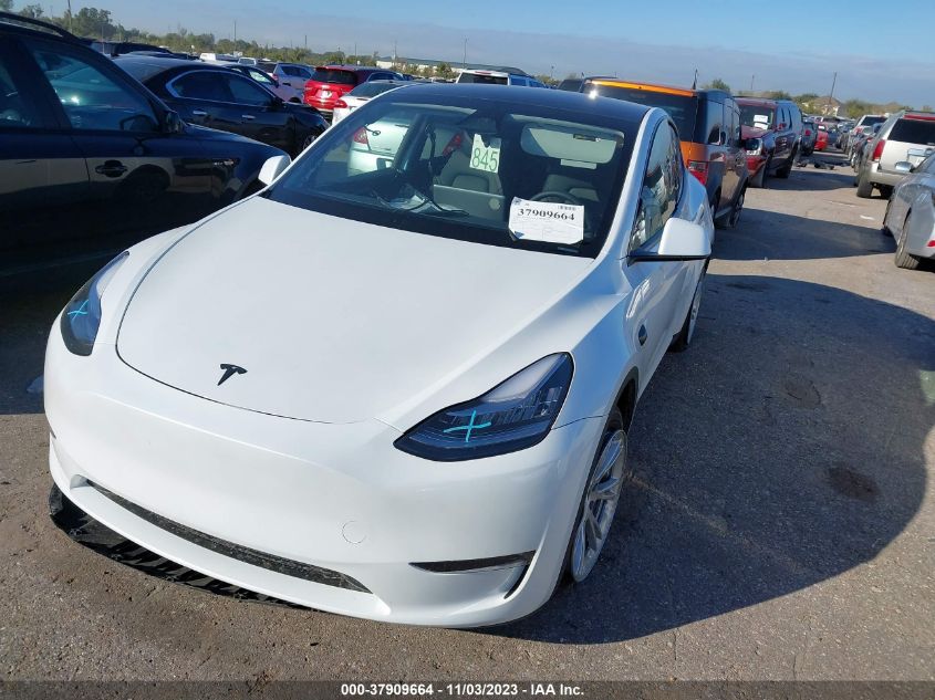 2023 Tesla Model Y VIN: 7SAYGDEE0PA157839 Lot: 37909664