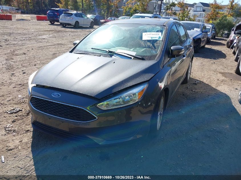 2016 Ford Focus Se VIN: 1FADP3F23GL393868 Lot: 37910669