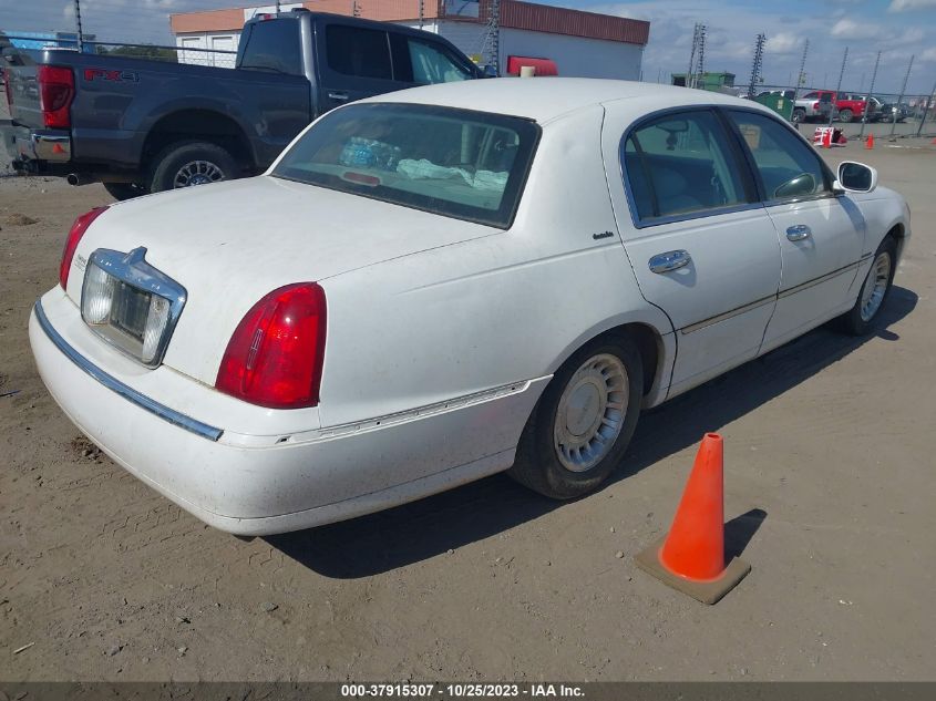 2001 Lincoln Town Car Executive VIN: 1LNHM81W81Y645017 Lot: 37915307