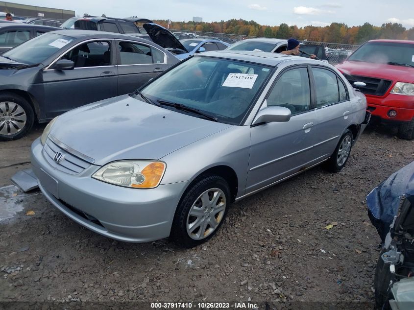 2003 Honda Civic Ex VIN: 1HGES26723L009982 Lot: 37917410