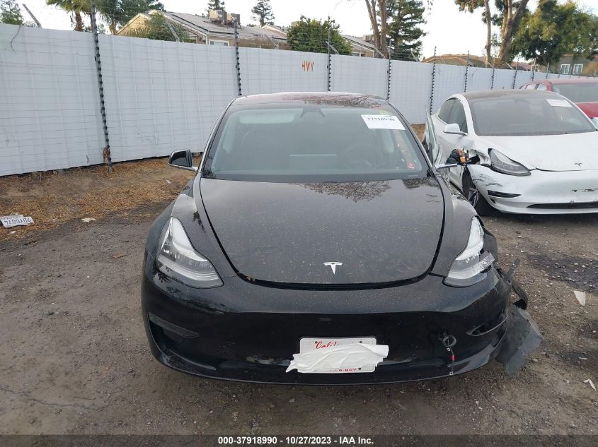 2018 Tesla Model 3 VIN: 5YJ3E1EA8JF040299 Lot: 37918990