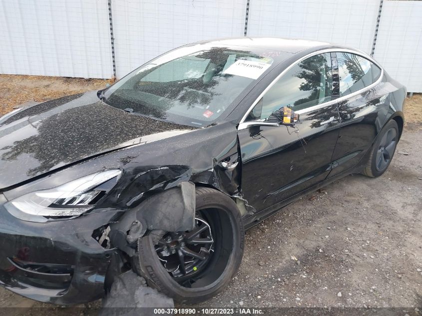 2018 Tesla Model 3 VIN: 5YJ3E1EA8JF040299 Lot: 37918990