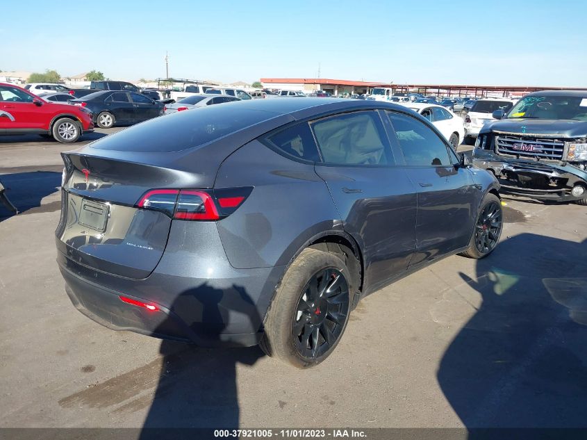 VIN 7SAYGDEE4PA079999 2023 Tesla Model Y, Awd/Long... no.4