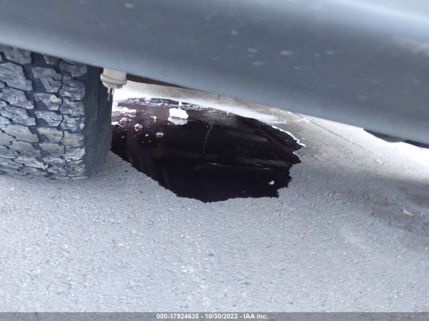 2002 Chevrolet Tahoe Lt VIN: 1GNEK13Z82J324284 Lot: 37924635