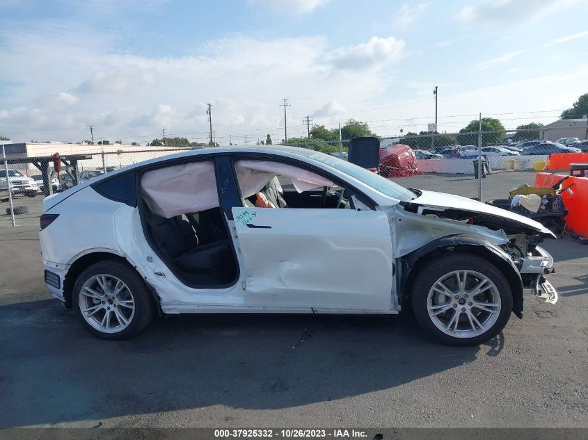 2023 Tesla Model Y VIN: 7SAYGDEE1PF789946 Lot: 37925332
