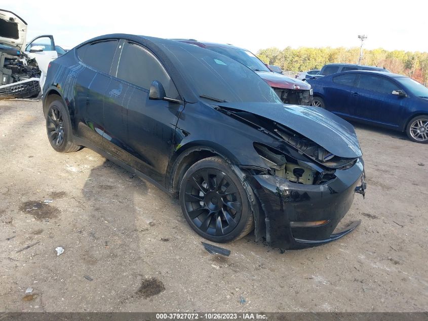 2023 Tesla Model Y Awd/Long Range Dual Motor All-Wheel Drive VIN: 7SAYGAEE8PF705524 Lot: 37927072