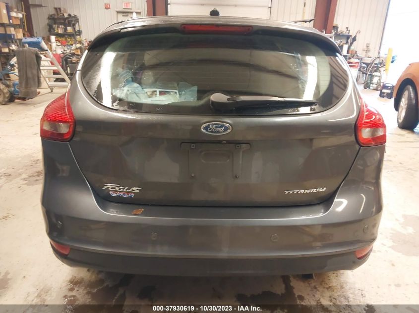 2015 Ford Focus Titanium VIN: 1FADP3N21FL310731 Lot: 37930619