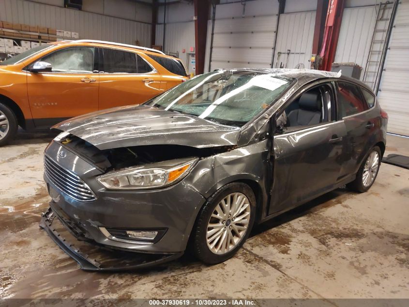 2015 Ford Focus Titanium VIN: 1FADP3N21FL310731 Lot: 37930619