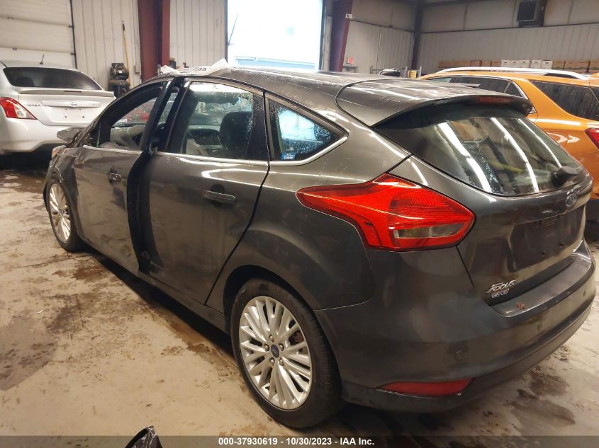 2015 Ford Focus Titanium VIN: 1FADP3N21FL310731 Lot: 37930619