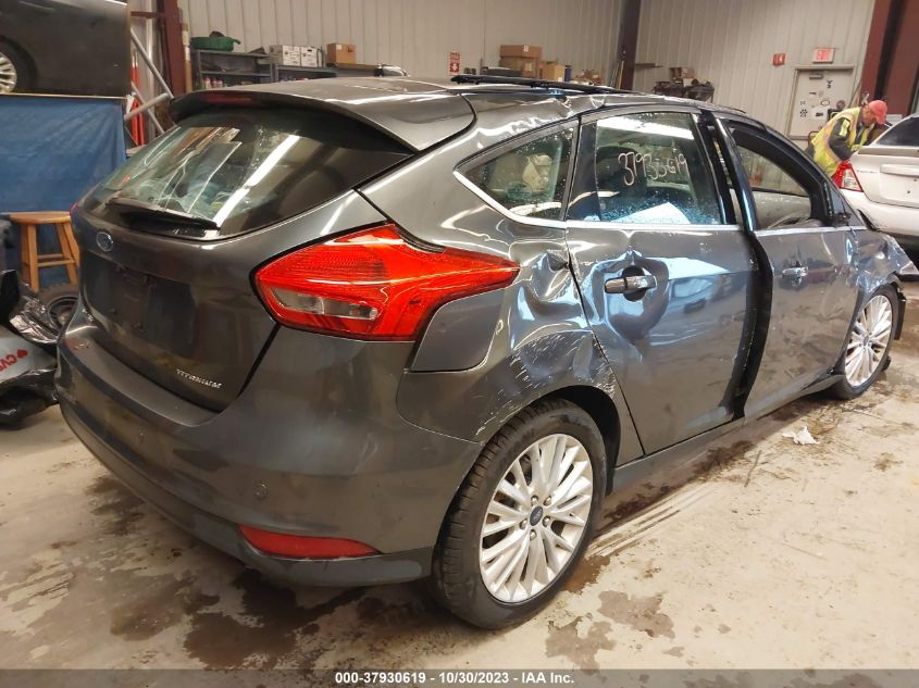 2015 Ford Focus Titanium VIN: 1FADP3N21FL310731 Lot: 37930619