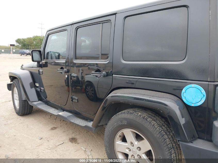 2007 Jeep Wrangler Unlimited Sahara VIN: 1J4GB59117L102749 Lot: 37939610