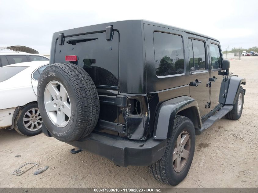 2007 Jeep Wrangler Unlimited Sahara VIN: 1J4GB59117L102749 Lot: 37939610