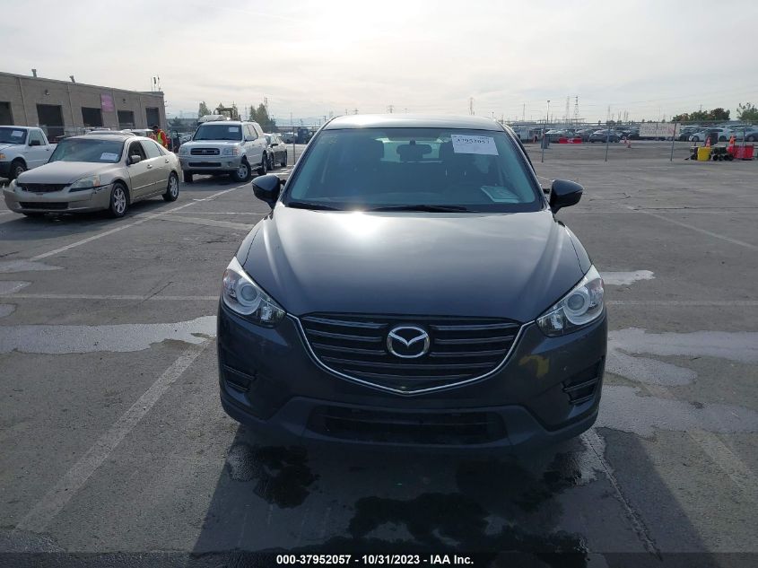 2016 Mazda Cx-5 Sport VIN: JM3KE2BYXG0778977 Lot: 37952057