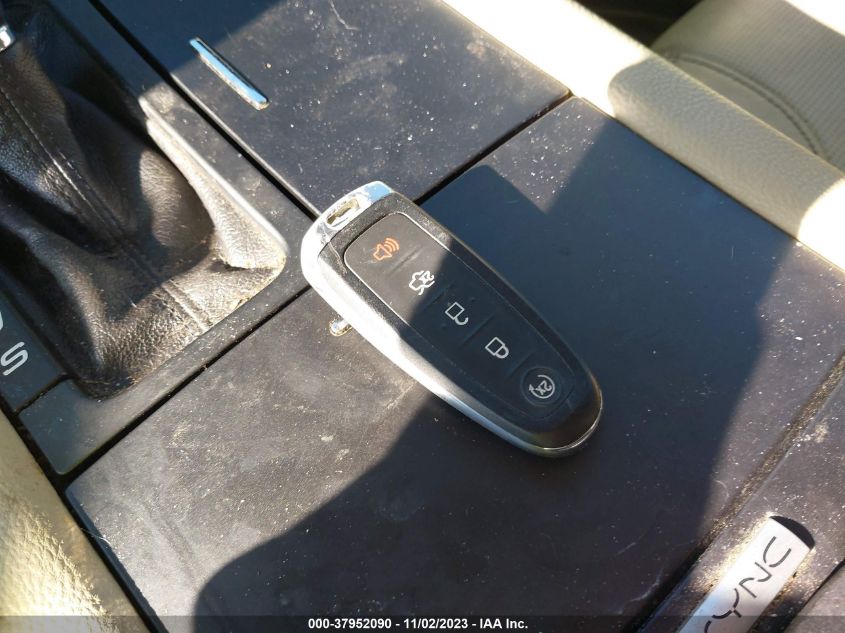 2015 Ford Taurus Limited VIN: 1FAHP2F8XFG170945 Lot: 37952090