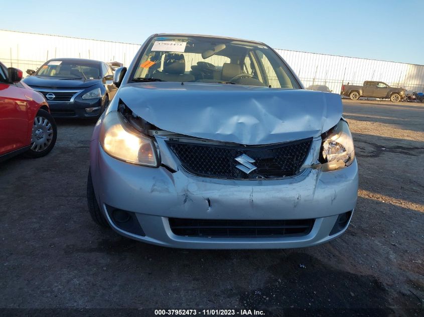 2010 Suzuki Sx4 Le/Le Popular VIN: JS2YC5A22A6302224 Lot: 37952473