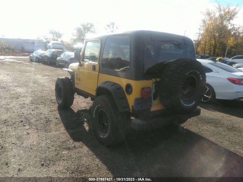 2000 Jeep Wrangler Sport VIN: 1J4FA49SXYP765166 Lot: 37957421