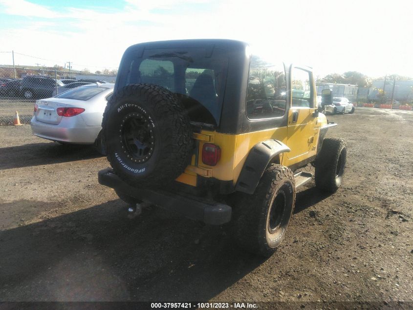 2000 Jeep Wrangler Sport VIN: 1J4FA49SXYP765166 Lot: 37957421