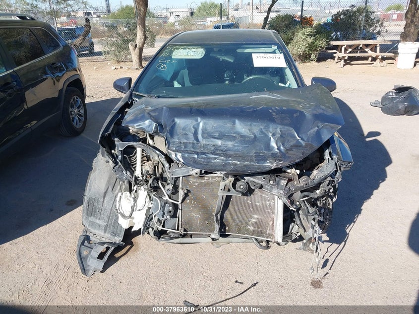 2016 Toyota Corolla L VIN: 2T1BURHE2GC599484 Lot: 37963610