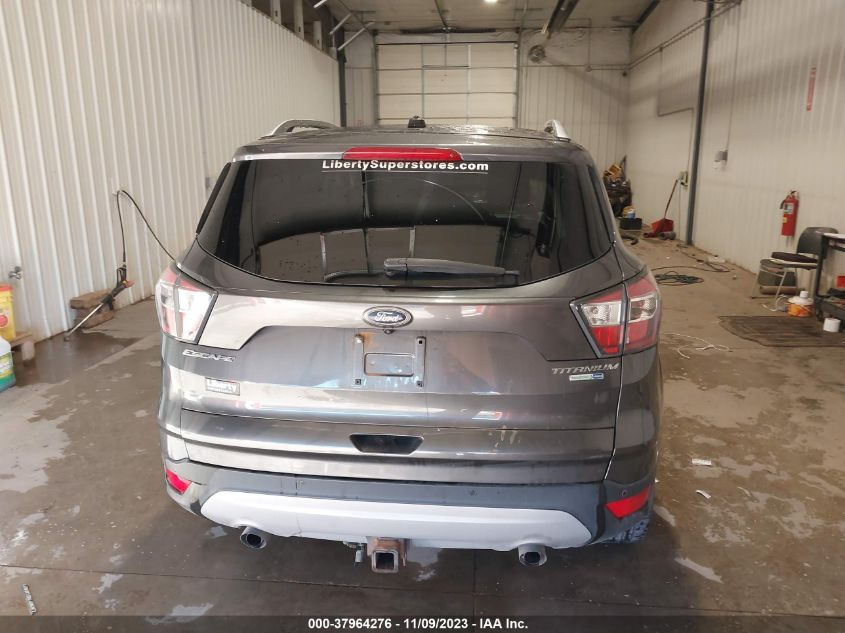 2017 Ford Escape Titanium VIN: 1FMCU9J94HUA00330 Lot: 37964276