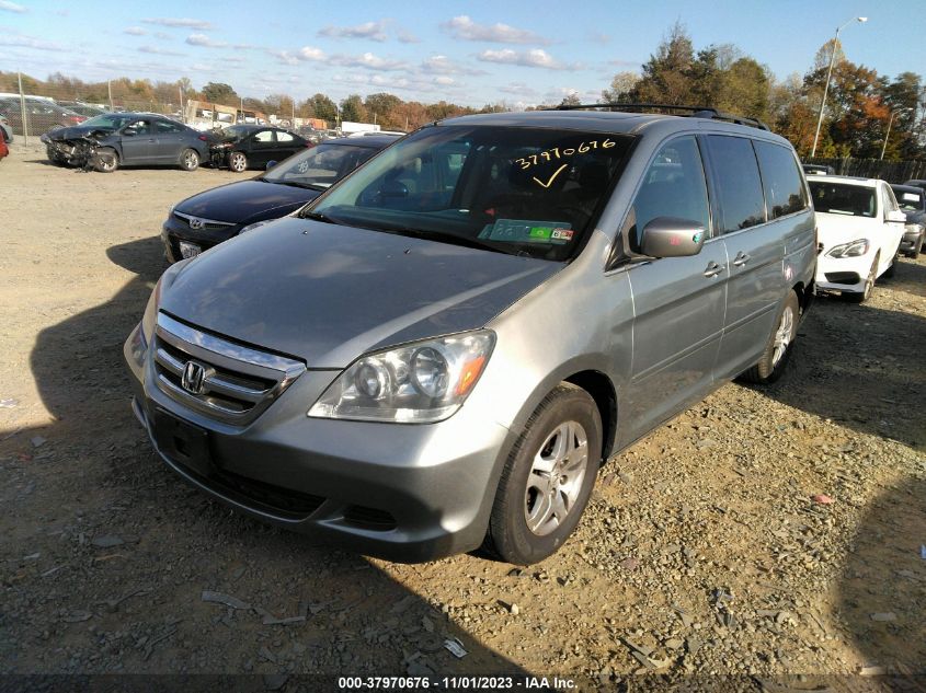 2007 Honda Odyssey Ex-L VIN: 5FNRL38667B099878 Lot: 37970676