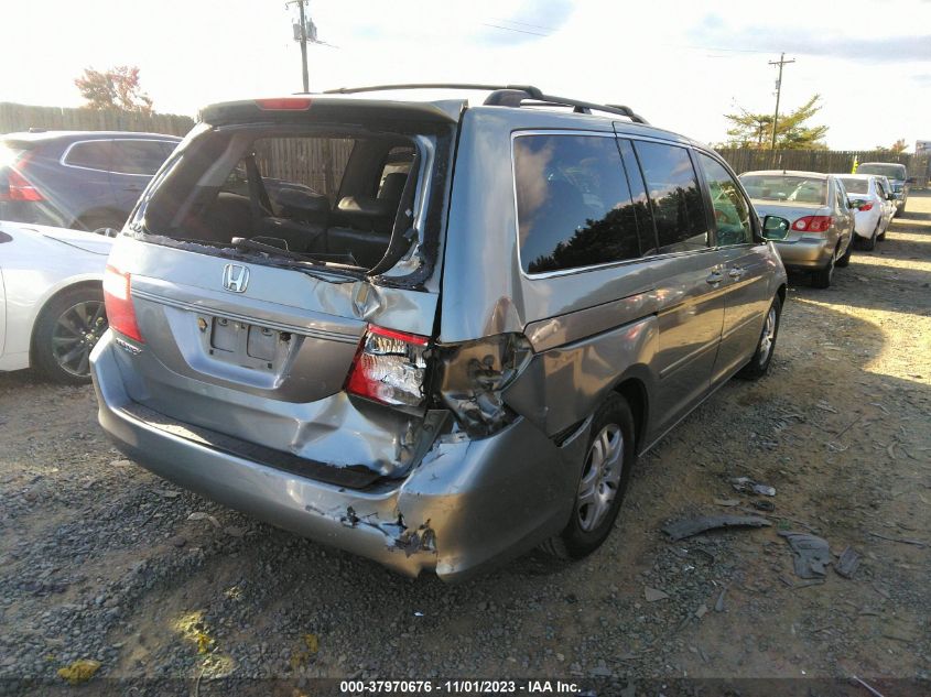 2007 Honda Odyssey Ex-L VIN: 5FNRL38667B099878 Lot: 37970676