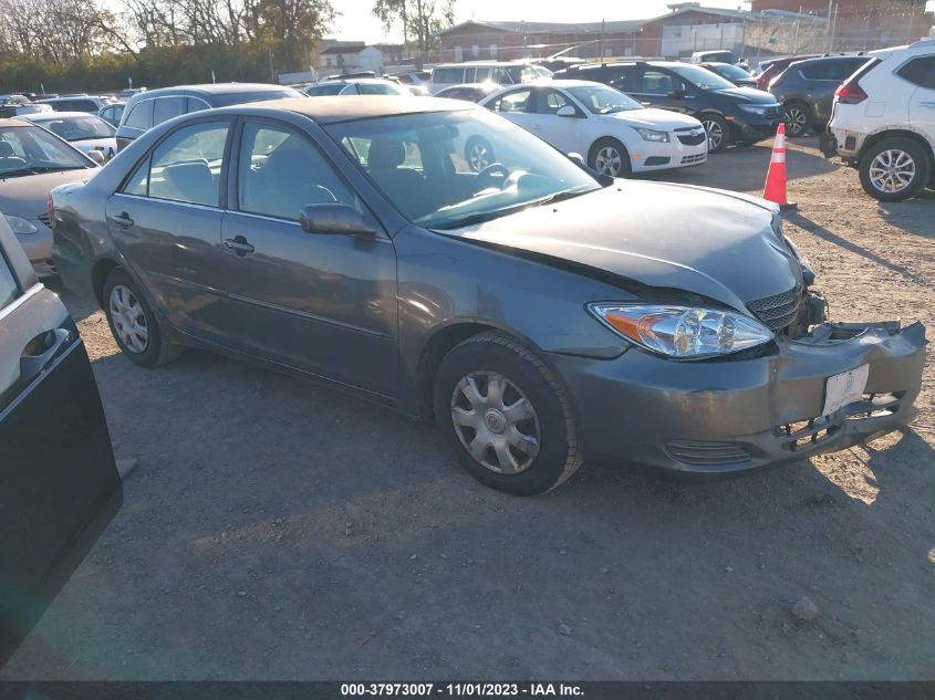 2003 Toyota Camry Le VIN: JTDBE32KX30236072 Lot: 37973007