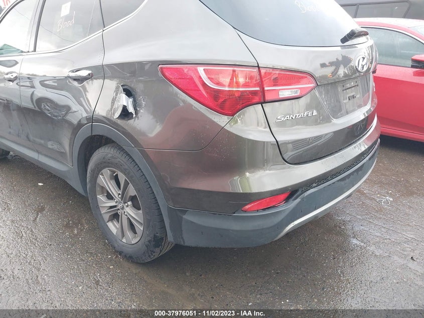 2014 Hyundai Santa Fe Sport 2.4L VIN: 5XYZTDLB0EG144278 Lot: 37976051