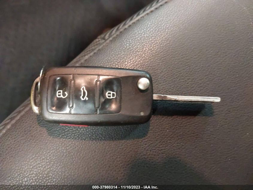 2014 Volkswagen Beetle 2.5L VIN: 3VWJP7AT2EM600831 Lot: 37980314