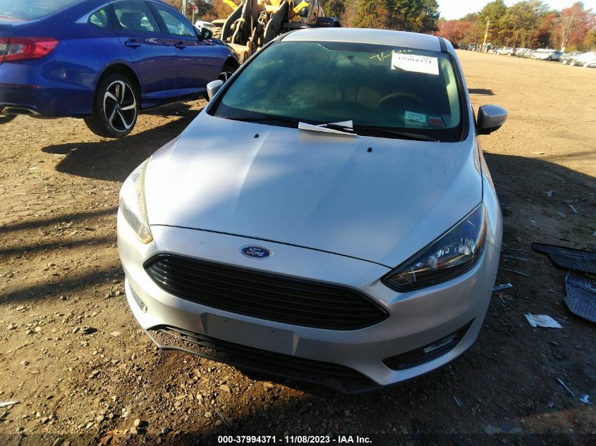 2018 Ford Focus Se VIN: 1FADP3FE2JL318418 Lot: 40759033