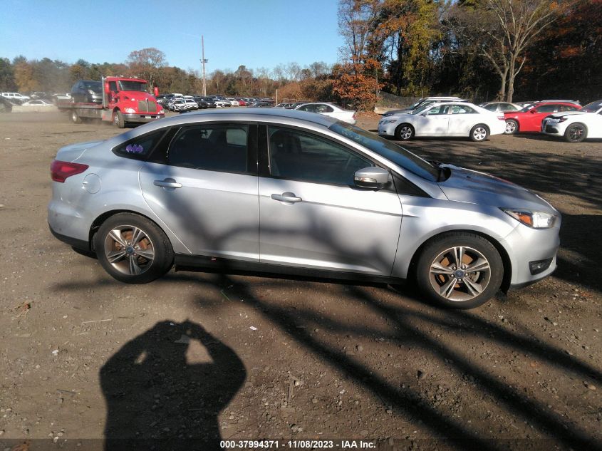 2018 Ford Focus Se VIN: 1FADP3FE2JL318418 Lot: 40759033